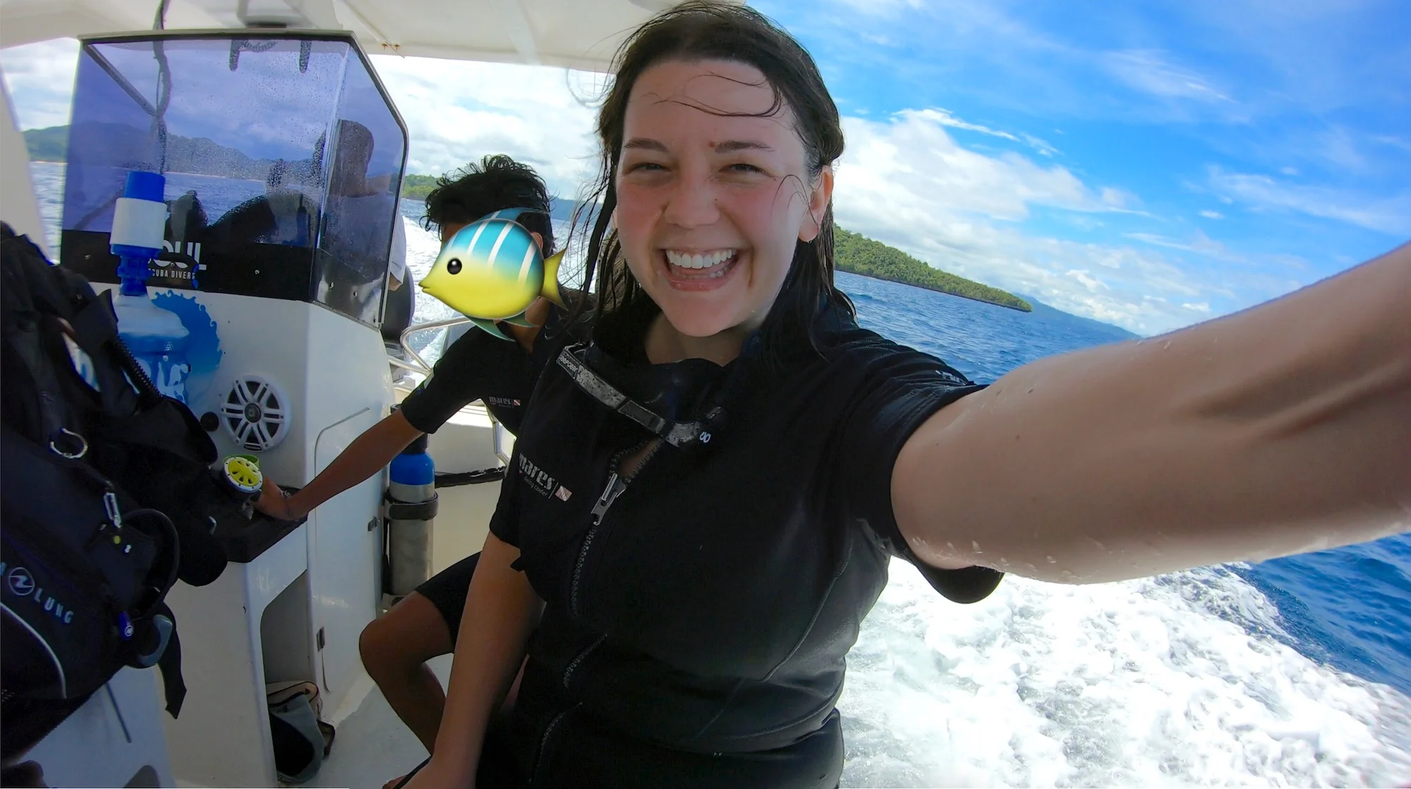 Tanya smiling on scuba diving boat in Raja Ampat